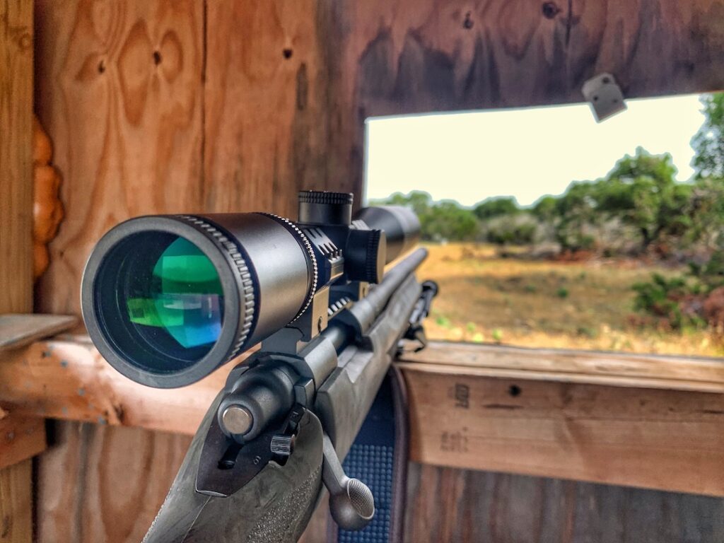 hunting blind and rifle